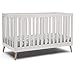 Delta Children Essex 4-in-1 Convertible Baby Crib, Bianca White with Natural Legs